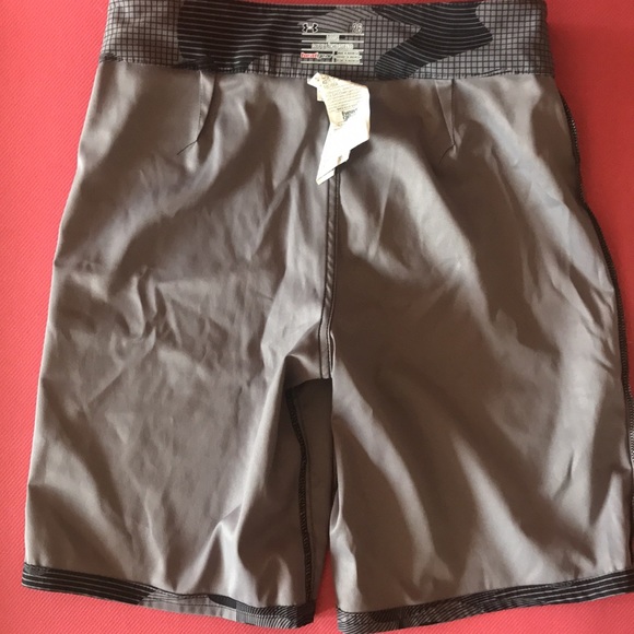 Never worn. No tags. Boys 26 Under Armour swim trunks - Picture 6 of 7